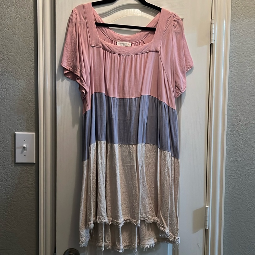 Pink, blue, and cream dress
